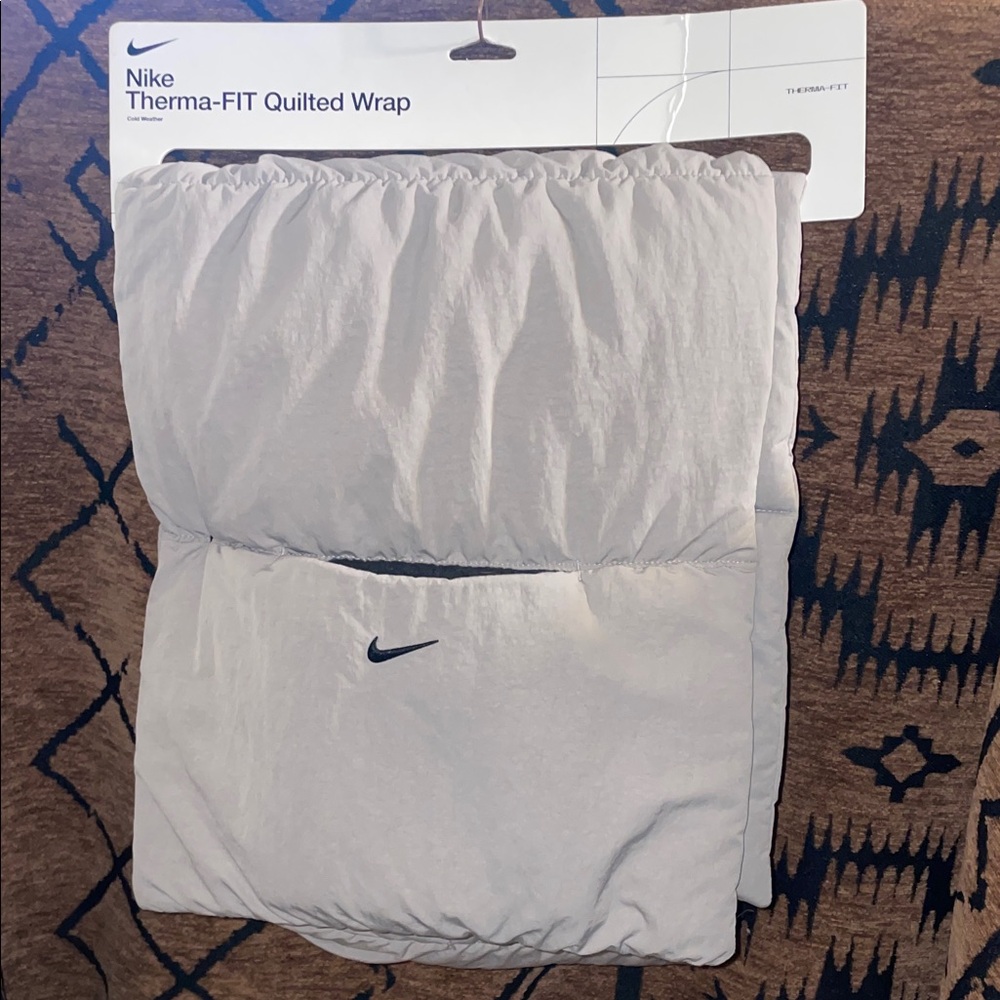 Nike Light Gray Water Resistant Quilted Wrap with Fleece Pocket Lining.Unisex